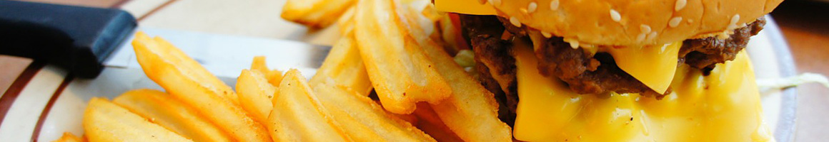 Eating American (Traditional) Burger at Stadium Inn restaurant in Michigan City, IN.